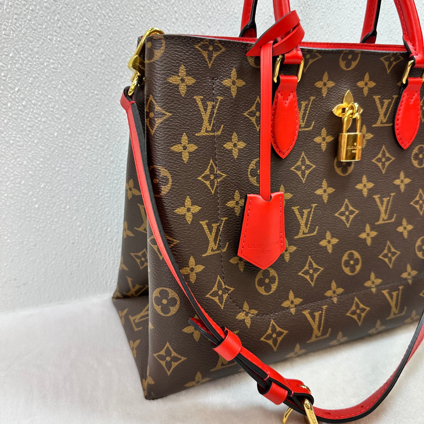 Flower Tote in Monogram Canvas and Coquelicot red leather trim Handbag Luxury Designer By Louis Vuitton, Size: Medium