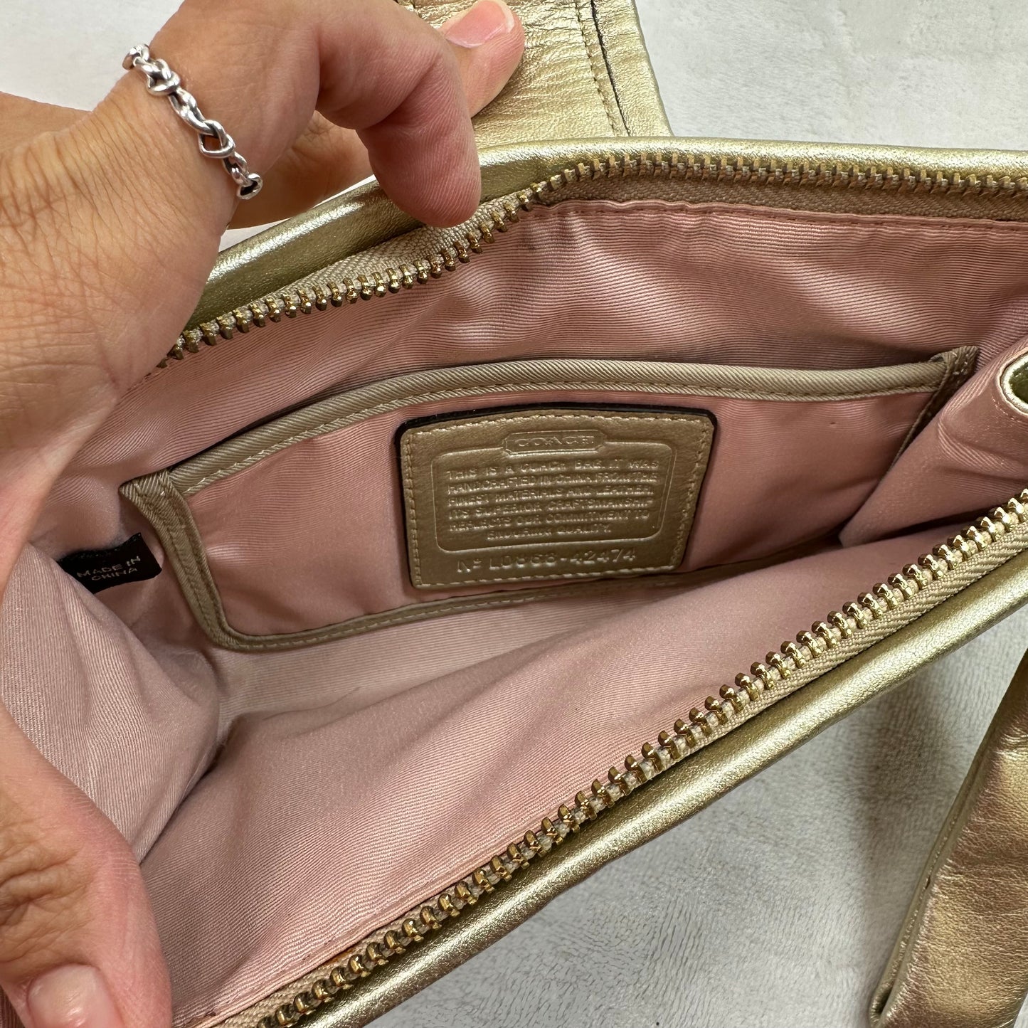 Clutch Designer By Coach, Size: Small