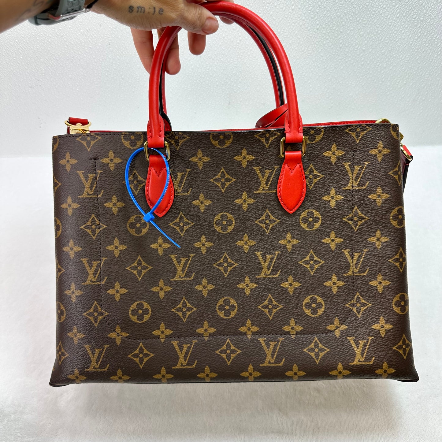 Flower Tote in Monogram Canvas and Coquelicot red leather trim Handbag Luxury Designer By Louis Vuitton, Size: Medium