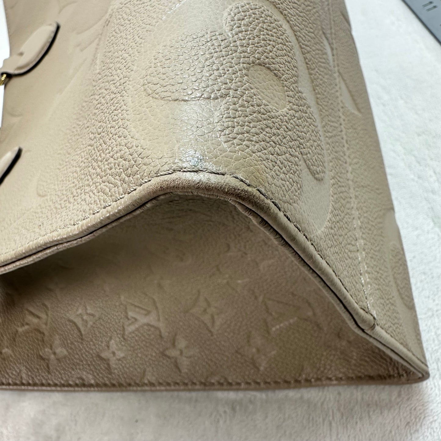 OnTheGo MM tote bag Tourterelle (turtledove) beige Monogram Empreinte leather Handbag Luxury Designer By Louis Vuitton, Size: Medium
